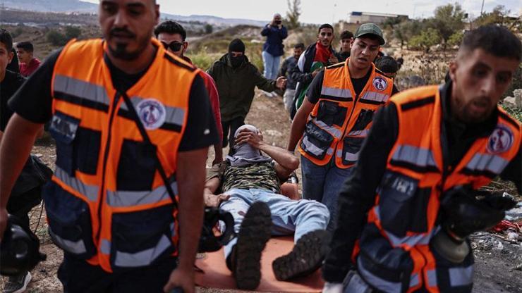 İsrail askerlerinden Filistinlileri kalabalığa saldırı: Ses bombası atıp, bir genci gerçek mermiyle bacağından vurdular! – Dünyadan Haberler CNN Türk